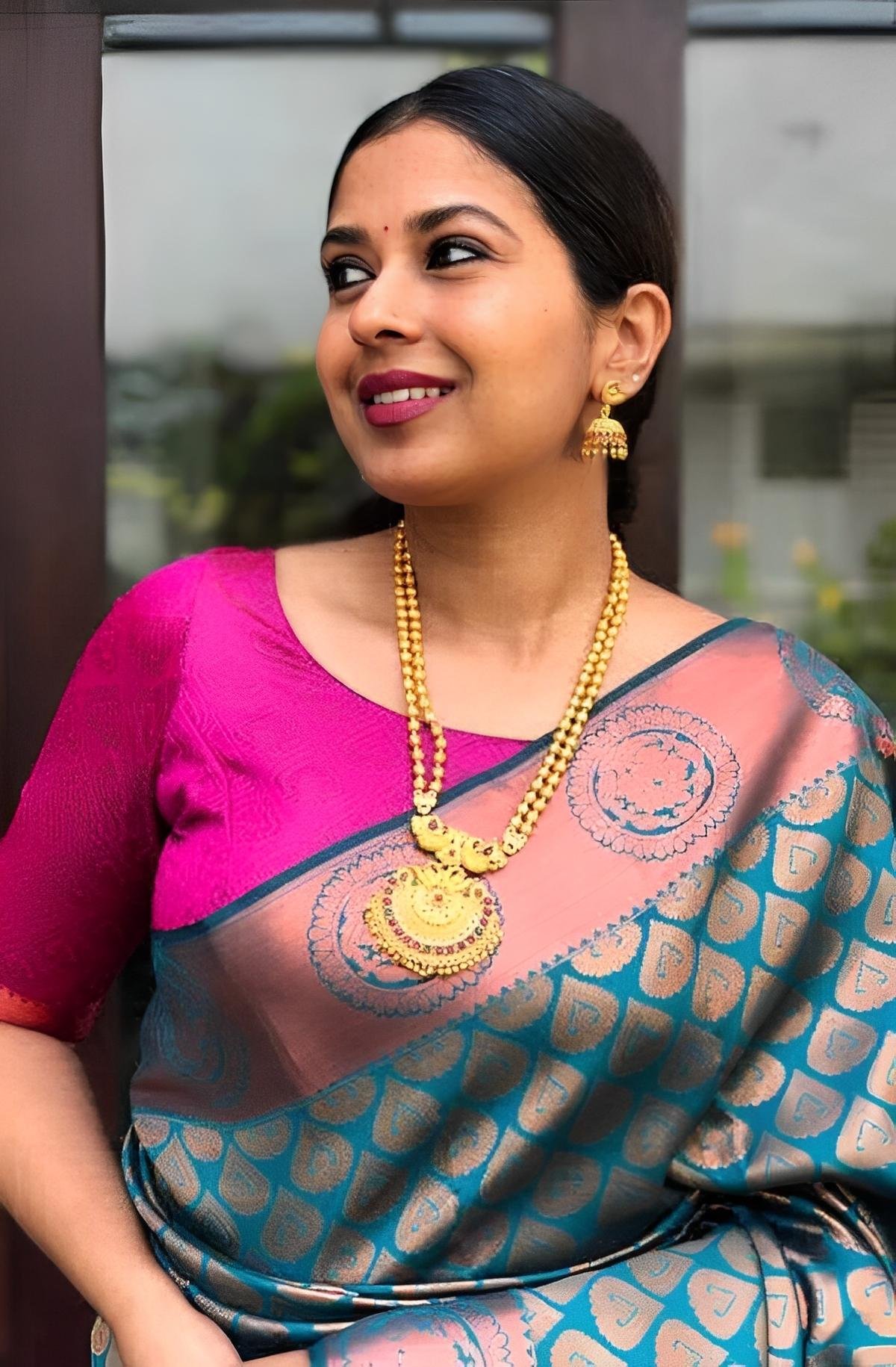 Teal & Rani Pink Banarasi Silk Saree – A Royal Fusion of Colours